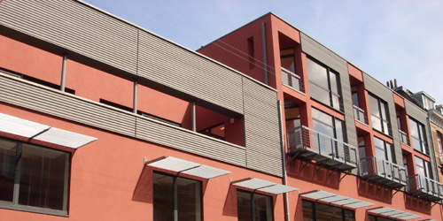 Transformation d'un complexe de bureaux comprenant une halle industrielle et 4 logements neufs - Schaerbeek (2008)